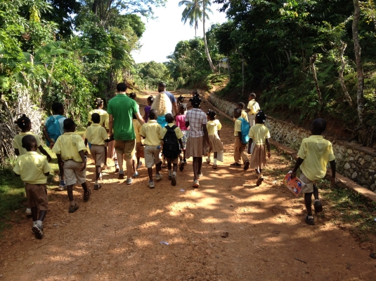 Walking with school children on a mountain road above Jeremie